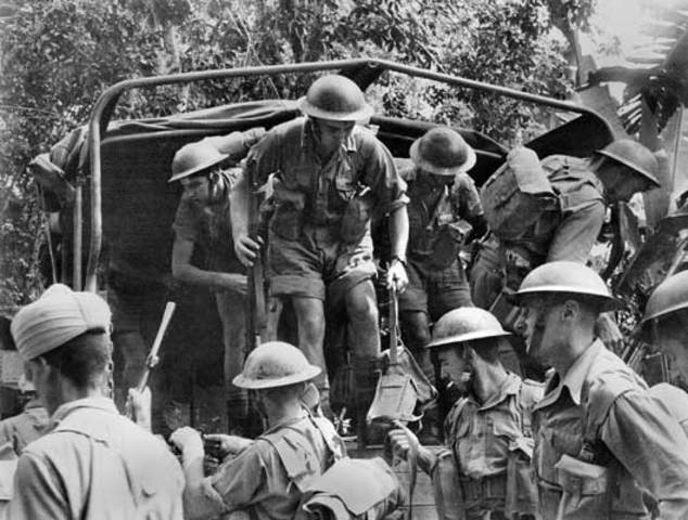 British troops retreat to  Singapore & bomb the causeway