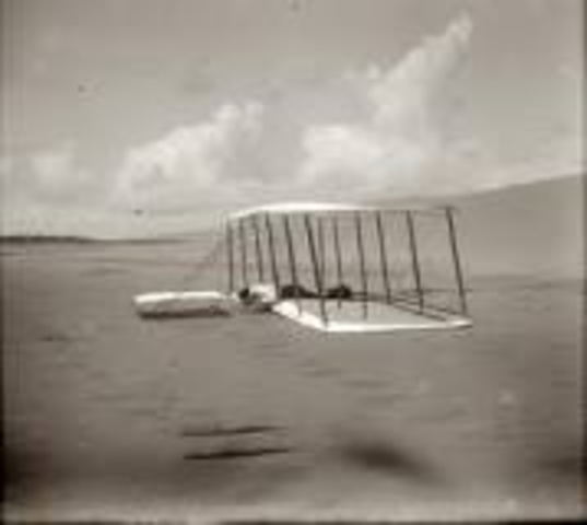 The Kitty Hawk makes its first flight