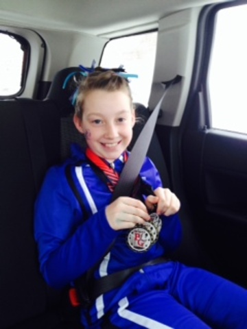 Adulthood-psychosocial  Daughter's first gymnastic meet