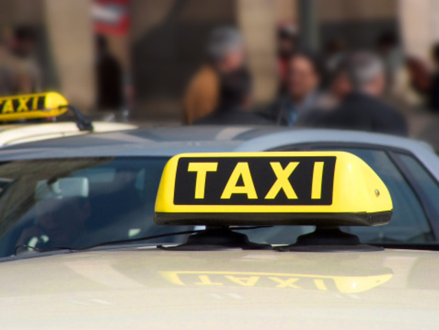 In a taxi, departing airport to Patch Barracks in Vaihingen, Stuttgart, Germany.