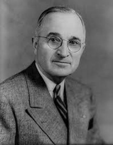 President Truman signs Executive Order 9981.