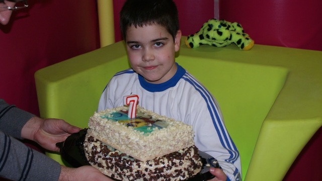 His parents bought him a cake only for he, because of his birthday.
