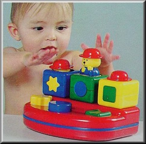 Child sees object and reaches for it