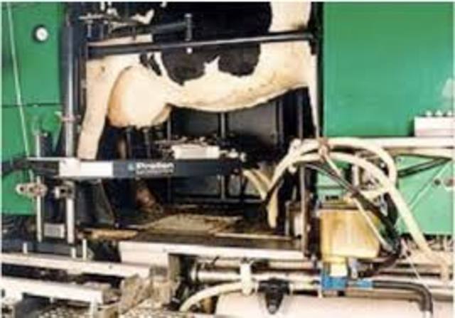 First Robotic Milking Machines