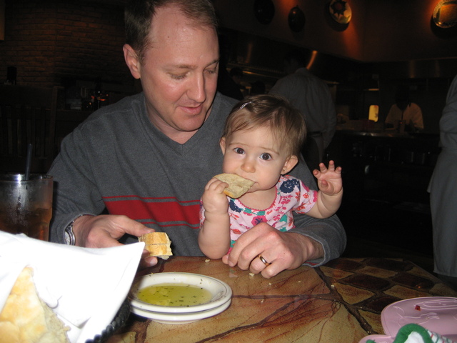 6 months. Eating solids and crawling.