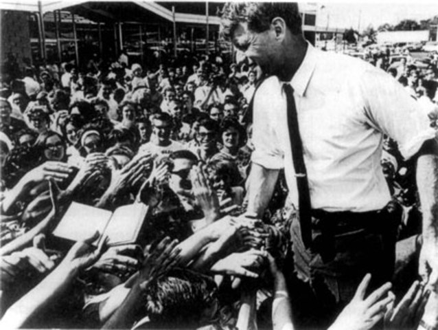Robert F. Kennedy states that U.S. troops would remain in Vietnam until Communism was defeated.