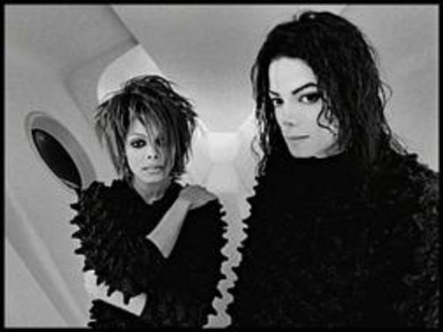 MJ, with sister, Janet receive 3 awards for their music video "Scream" at MTV's Video Music Awards in NYC