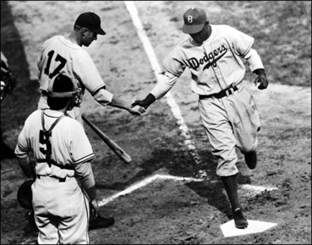 Jackie scores first homerun against the Pirates.