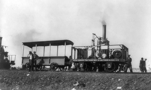 Peter Cooper invented then tried out the first  steam powered "train."