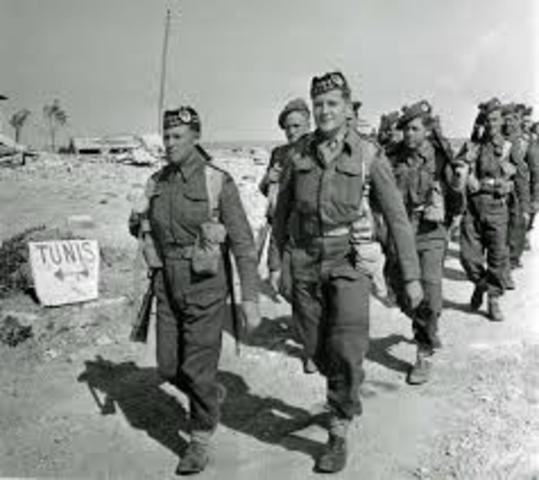 British and US forces defeat German and Italian armies in North Africa