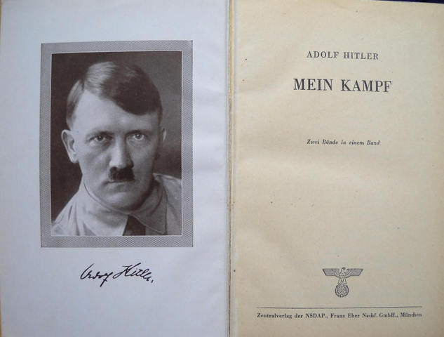 Hitler writes Mein Kampf.