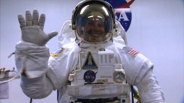 Copernicus in a space suit ready for space mission