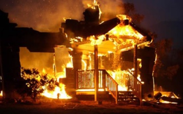 Captain Beatty, Montag, and two other fireman receive a call to burn a house with books