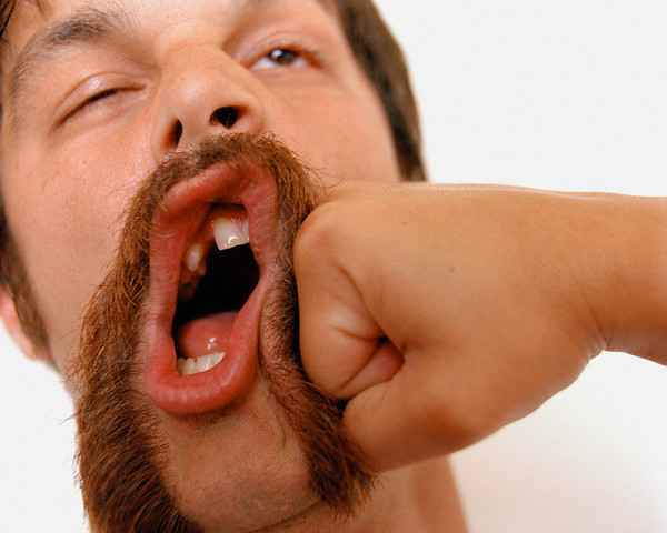 Mr. Travis beating on Mawee