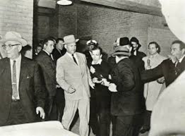 Lee Harvey Oswald is shot and killed