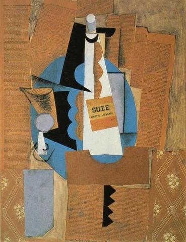 Glass and bottle of suze