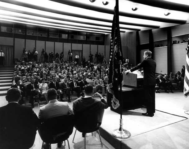 Kennedy giving a speech during the Cold War