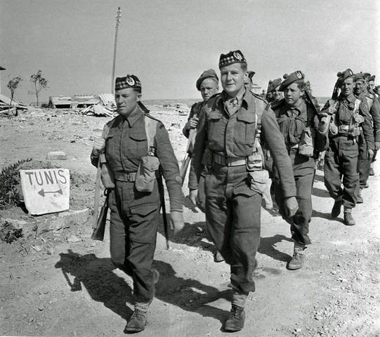 British and US forces defeat German and Italian armies in North Africa