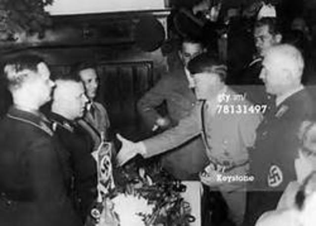 Adolf Hitler becomes the leader of the Nazi Party.