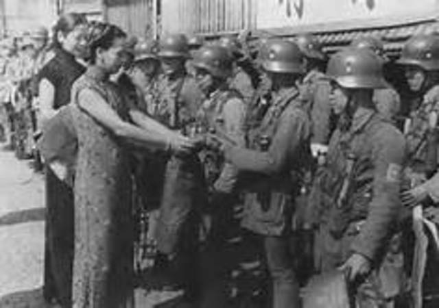 Japan’s army pillages Nanjing, China; massacre a quarter of a million people