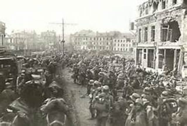 British and US forces defeat German and Italian armies in North Africa