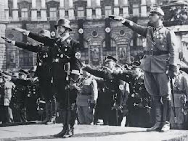 Germany, Italy, Great Britain, and France sign the Munich agreement which forces the Czechoslovak Republic to cede the Sudetenland, including the key Czechoslovak military defense positions, to Nazi Germany.