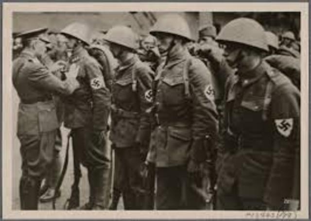 Under German pressure, the Slovaks declare their independence and form a Slovak Republic. The Germans occupy the rump Czech lands in violation of the Munich agreement, forming a Protectorate of Bohemia and Moravia.