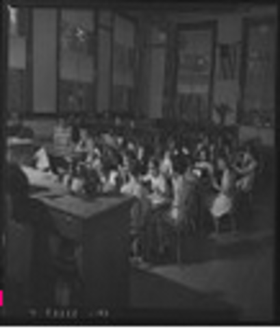 4 African American college students hold a sit-in