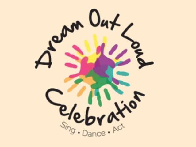 Volunteers with girl scout troup at a performing arts disability centers