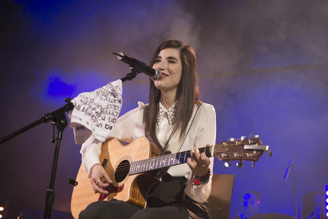 She began playing guitar