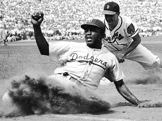 Jackie Robinson joins the Dodgers