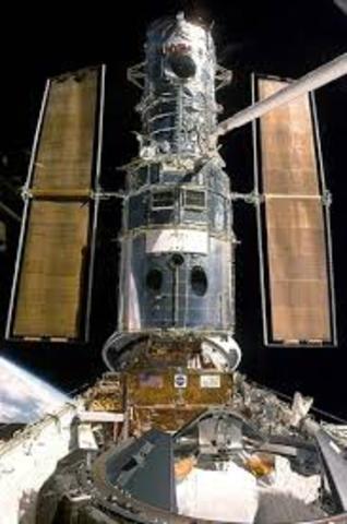 Hubble Space Telescope put into orbit from space shuttle Discovery.