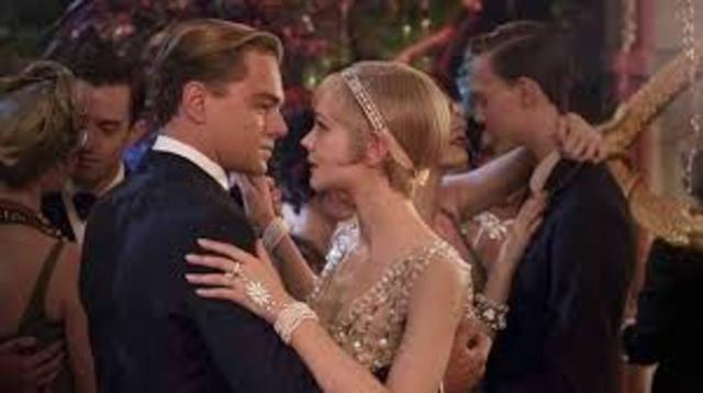 Daisy agrees to go to West Egg with Nick, then reunites with Gatsby.