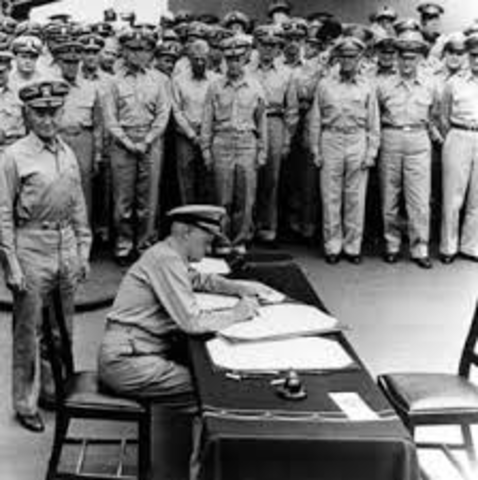 Japanese agree to unconditional surrender.