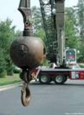 The crane's hook mess Dad's face up.