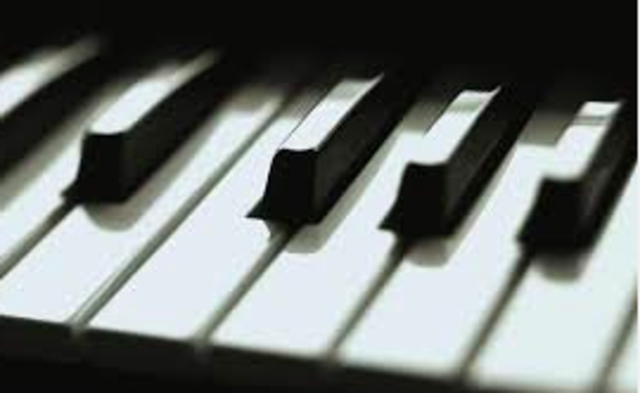 Began taking piano lessons.