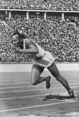 Jesse Owens wins four Gold Medals at Olympics in Germany