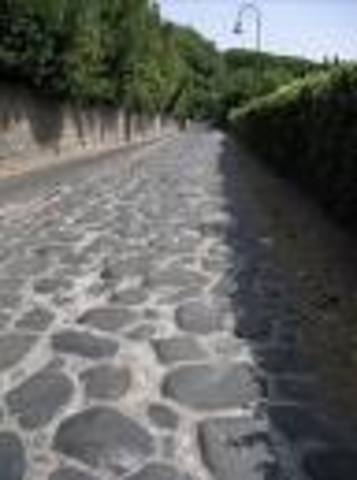 Magister Kless iter faciebat per Viam Appiam et volebat advenire ad urbem celeriter.