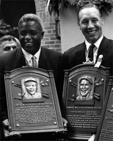 Bob Feller and Jackie Robinson are selected for the Baseball Hall of Fame in their first years of eligibility.