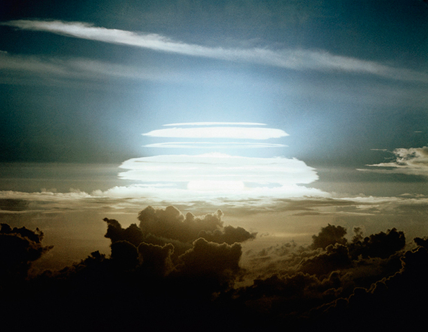 The United States conducts the first airborne test of an improved hydrogen bomb