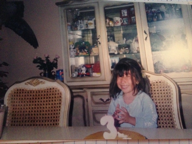 Celebrating 3 years of age. Blowing candles, asking for a wish