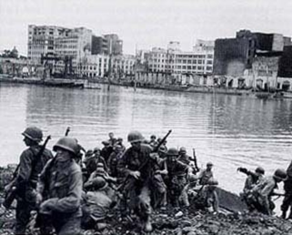 US troops land in the Philippines.