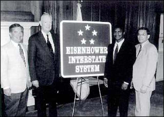 1956 - The Federal Highway Act is signed, marking the beginning of work on the interstate highway system.