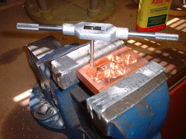 5. Cut or ‘tap’ new threads into the hole