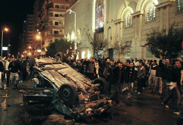 Bomb kills 10 people at  mass in a Roman Catholic church.