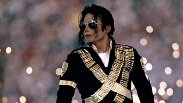 XXVII - Michael Jackson and 3,500 local children. Finale included audience card stunt.