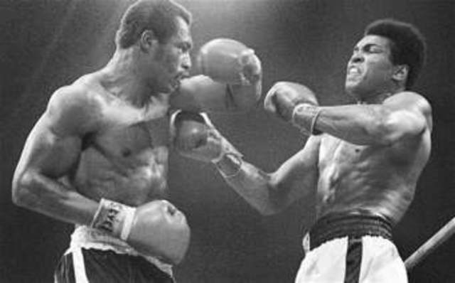 Cassius Clay wins heavyweight title for first time