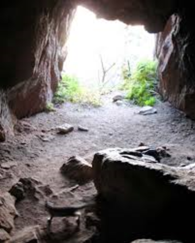 He discovers a cave where he hides out from a severe weaher. He sents up camp for 10 days.