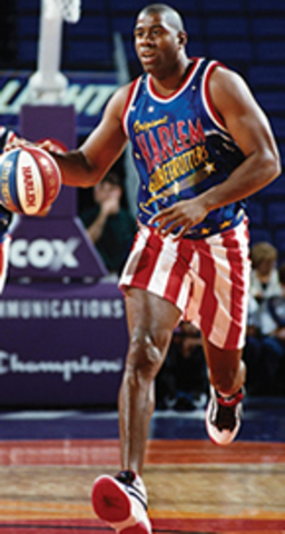1997 - "Magic" Johnson signs with Globetrotters