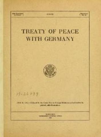 The Treaty of Versailles officially ends WW1